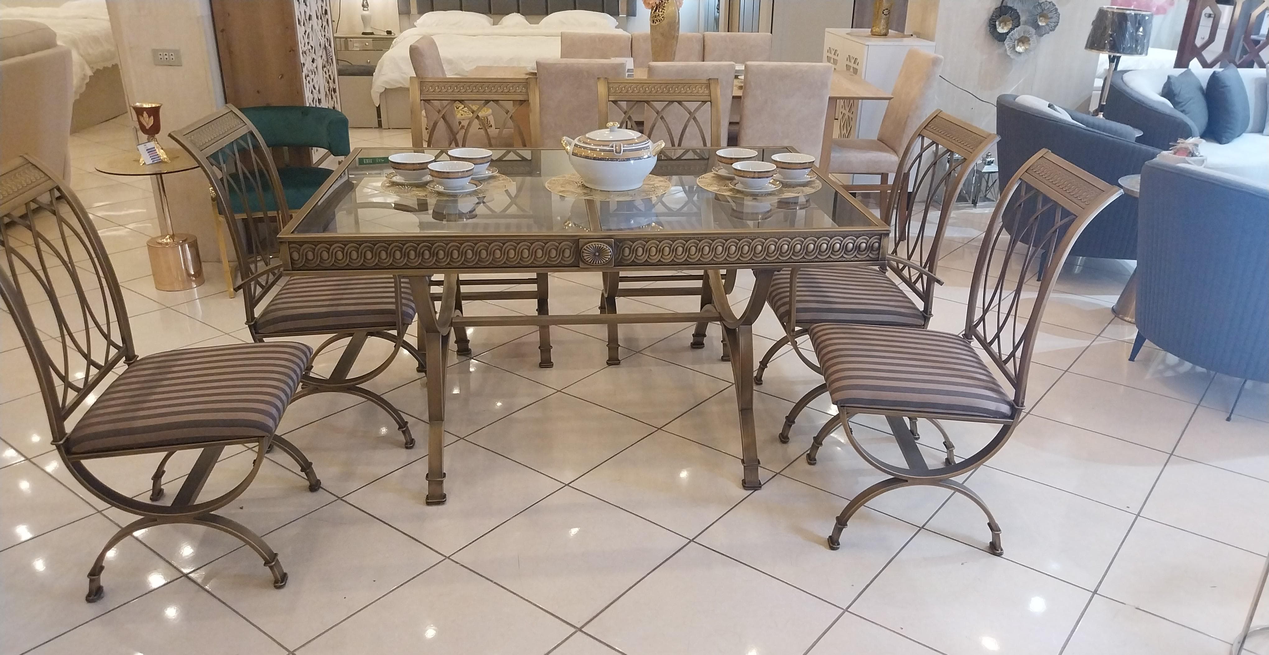 طاولة طعام 6 كراسي حديد برونزي سطح قزاز م/ 490